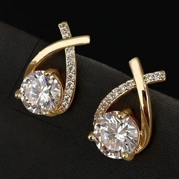 kolczyki_lumina_swirl_gold_sara_baranska_01