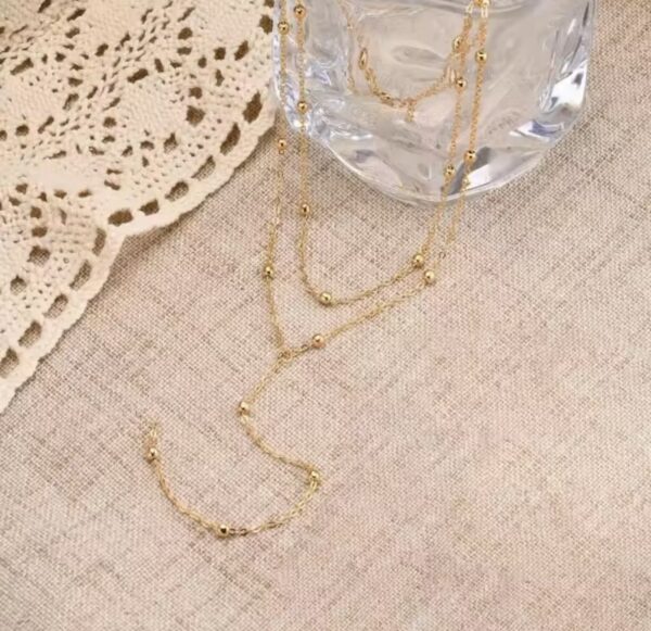 naszyjnik_lunaria_drop_golden_glow_orvella naszyjnik_lunaria_drop_golden_glow_orvella