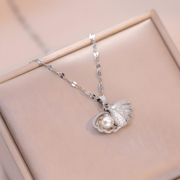 kolie_pearl_secret_shell_silver_edition_sara_baranska_01