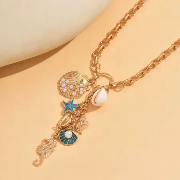tresor_de_la_mer_gold_naszyjnik_z_naturalna_muszla_orvella2 tresor_de_la_mer_gold_naszyjnik_z_naturalna_muszla_orvella2