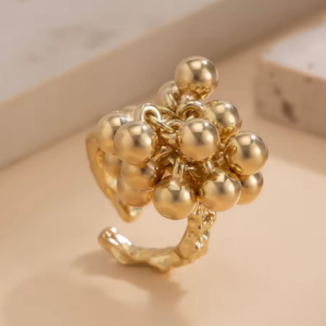 Pierścionek ze stali szlachetnej z kompozycją połyskujących kul  AURELIS ORBEA gold